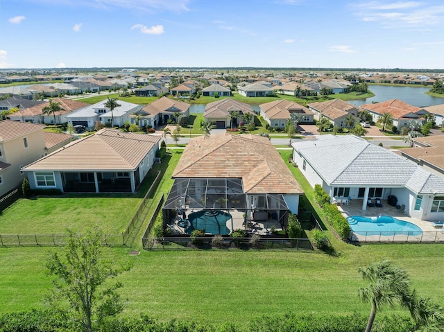 9129 SW Pepoli Way, Port Saint Lucie, FL 34987 - aerial view of residential area with a pool and a large body of water