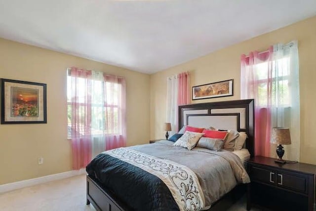 2646 Treanor Ter, Wellington, FL 33414 - bedroom with light colored carpet and baseboards