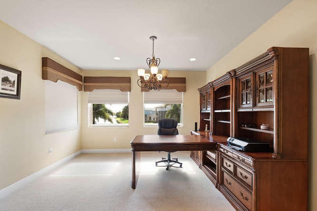 2646 Treanor Ter, Wellington, FL 33414 - home office with light colored carpet, recessed lighting, baseboards, and a chandelier