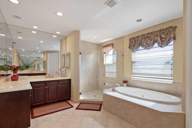 2646 Treanor Ter, Wellington, FL 33414 - full bathroom with visible vents, recessed lighting, a stall shower, a bath, and vanity