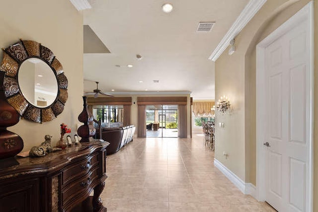 2646 Treanor Ter, Wellington, FL 33414 - corridor with light tile patterned floors, baseboards, visible vents, recessed lighting, and crown molding