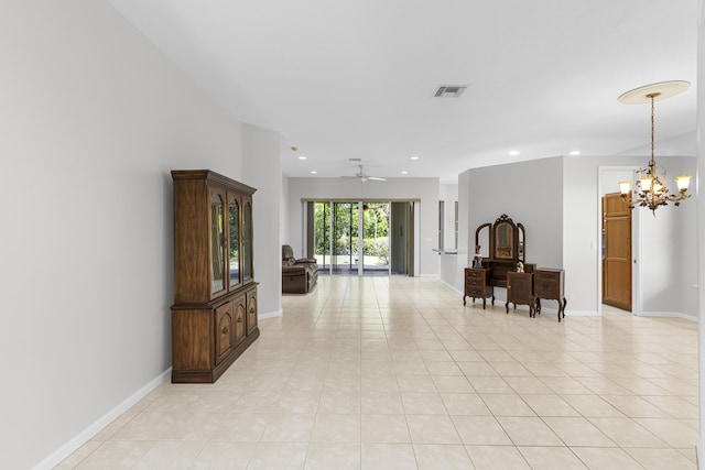 hall featuring an inviting chandelier, light tile patterned flooring, recessed lighting, and visible vents