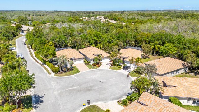 bird's eye view with a residential view and a forest view