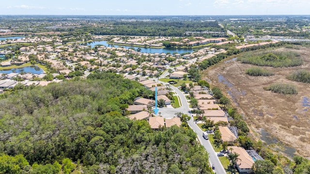 aerial view with a residential view and a water view
