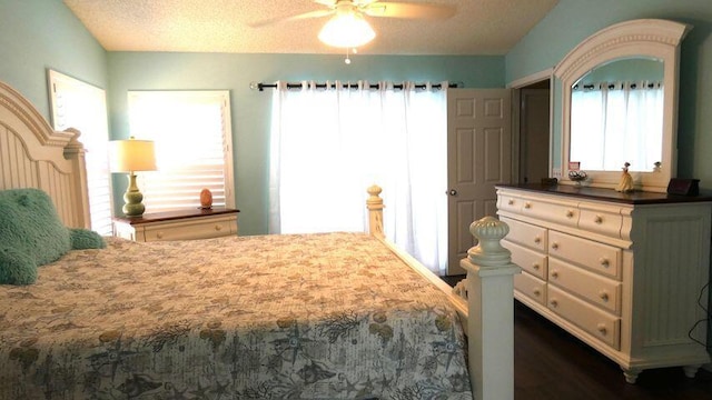 bedroom featuring a textured ceiling and ceiling fan