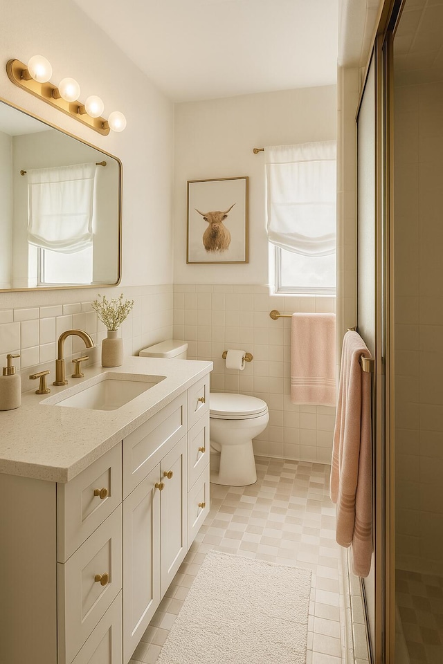 2076 E Main St, Pahokee, FL 33476 - full bath featuring vanity, tile walls, a stall shower, and wainscoting