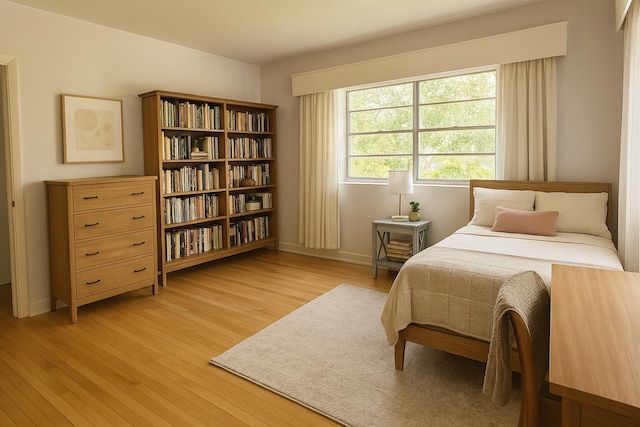 2076 E Main St, Pahokee, FL 33476 - bedroom featuring light wood-type flooring and baseboards