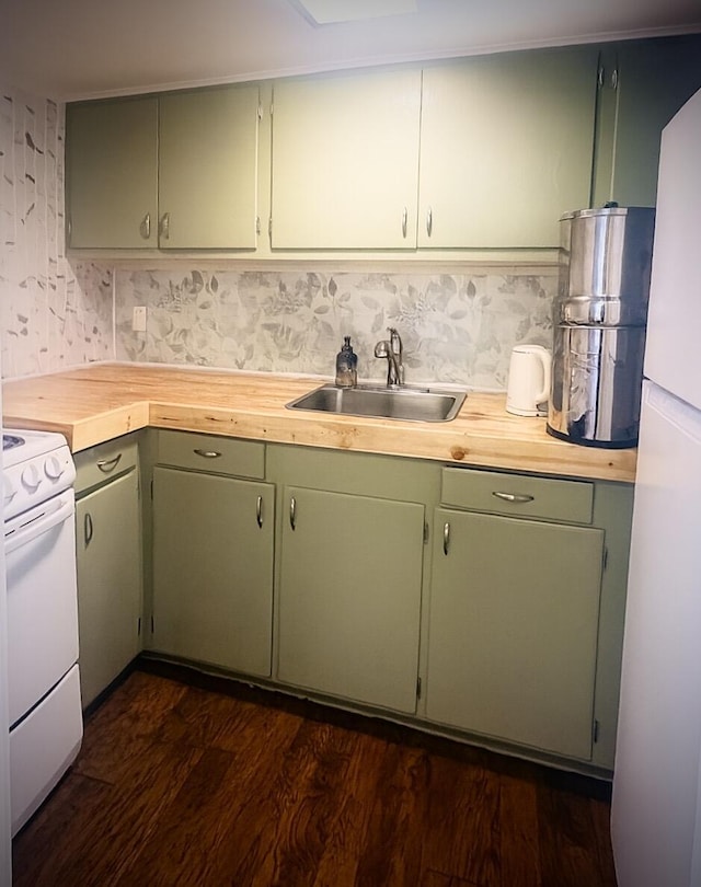 2076 E Main St, Pahokee, FL 33476 - kitchen featuring white appliances, dark wood-style floors, and butcher block countertops