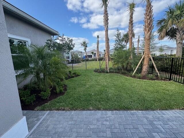 view of yard featuring a fenced backyard and a patio