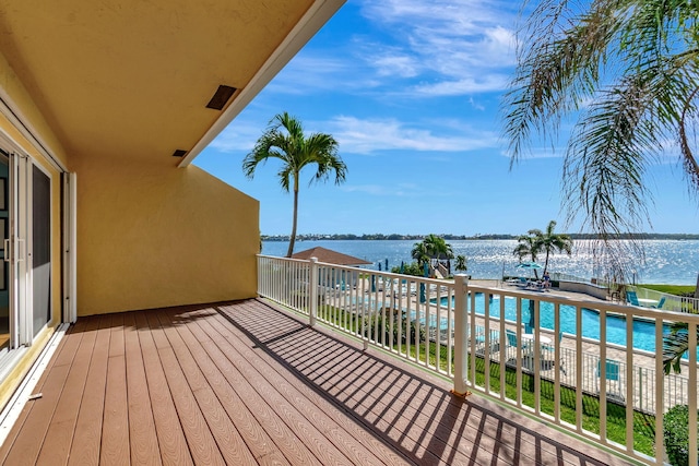 balcony featuring a water view