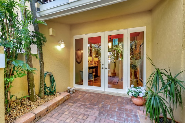 tiled entrance foyer featuring stairs, baseboards, and visible vents