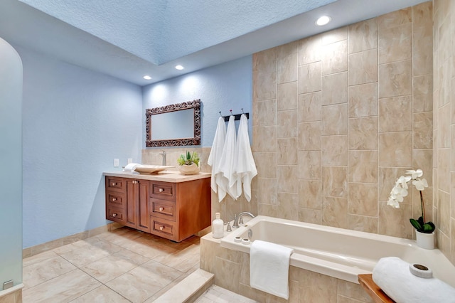 bedroom featuring a textured ceiling, light wood-style floors, and ornamental molding