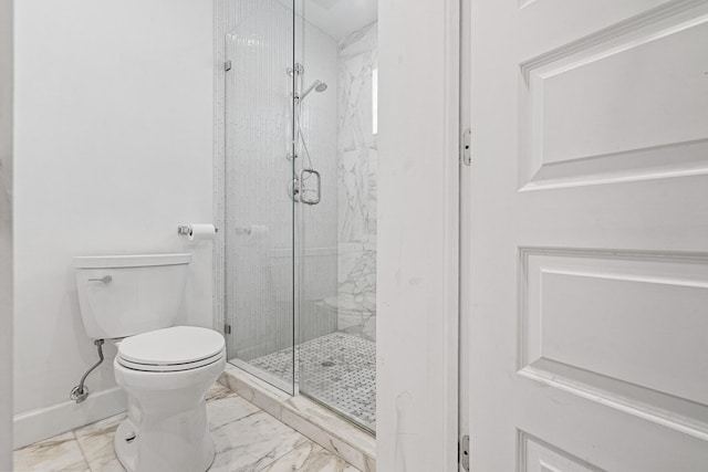 full bathroom featuring a shower stall, marble finish floor, baseboards, and toilet