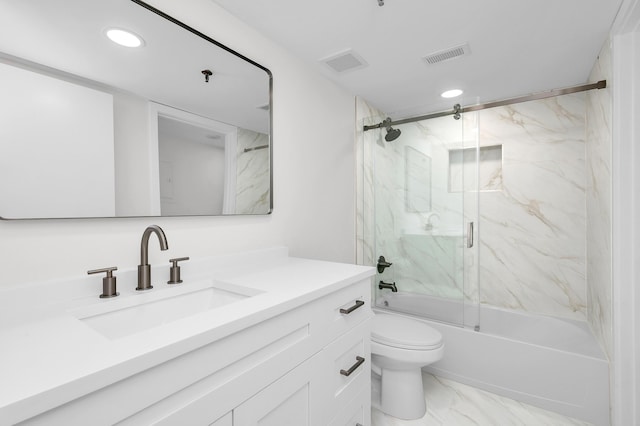 bathroom featuring toilet, visible vents, marble finish floor, and enclosed tub / shower combo
