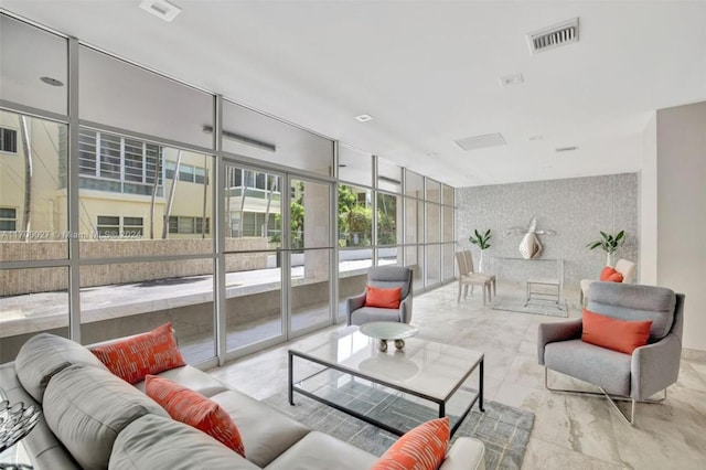 3113 S Ocean Dr Unit 301, Hallandale Beach, FL 33009 - living area featuring a wall of windows and visible vents