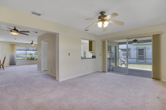 4475 Pine Park Cir, Lake Worth, FL 33467 - unfurnished room featuring carpet flooring, a ceiling fan, visible vents, and baseboards