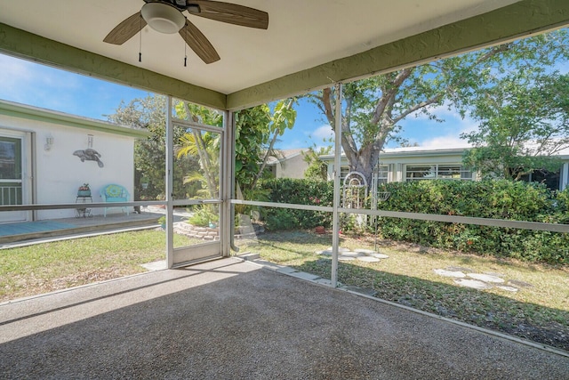 4475 Pine Park Cir, Lake Worth, FL 33467 - unfurnished sunroom with a ceiling fan