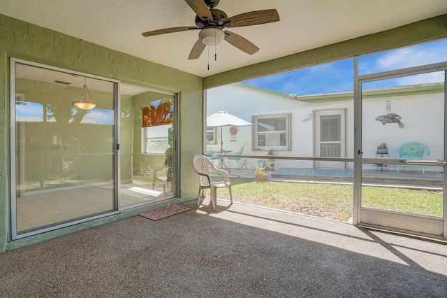 4475 Pine Park Cir, Lake Worth, FL 33467 - sunroom / solarium featuring a healthy amount of sunlight and a ceiling fan