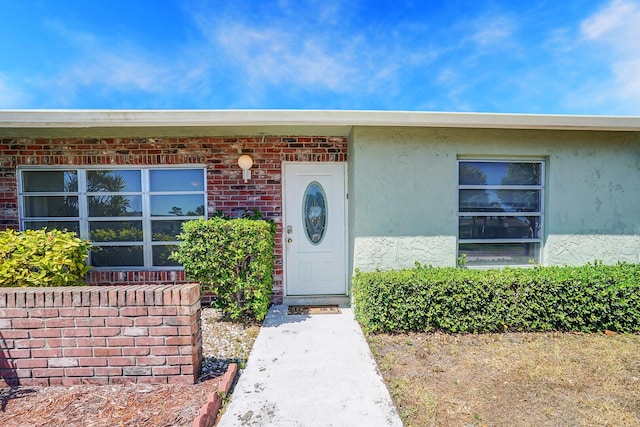 4475 Pine Park Cir, Lake Worth, FL 33467 - property entrance with brick siding and stucco siding
