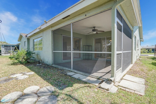 4475 Pine Park Cir, Lake Worth, FL 33467 - exterior space featuring ceiling fan and a sunroom
