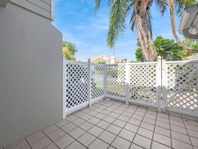 3642 SW Sunset Trace Cir, Palm City, FL 34990 - view of patio / terrace with a gate