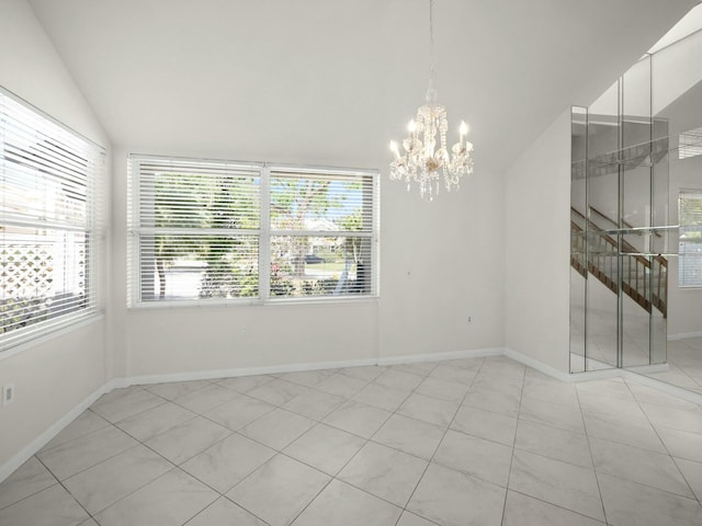 3642 SW Sunset Trace Cir, Palm City, FL 34990 - unfurnished room featuring a notable chandelier, baseboards, and lofted ceiling