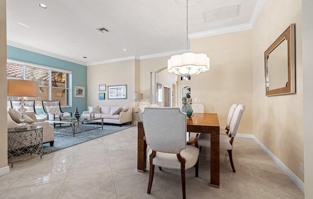 dining space featuring visible vents, crown molding, and baseboards