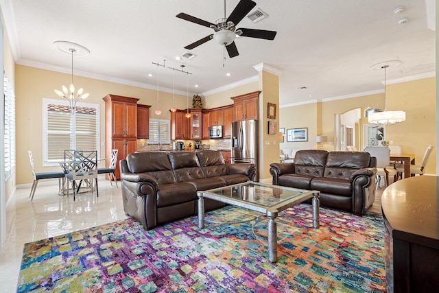 living area featuring visible vents, ornamental molding, ceiling fan with notable chandelier, light tile patterned flooring, and baseboards
