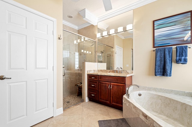 full bathroom featuring tile patterned floors, ornamental molding, a stall shower, a bath, and vanity