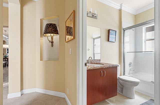 full bath with toilet, crown molding, tile patterned flooring, bath / shower combo with glass door, and vanity