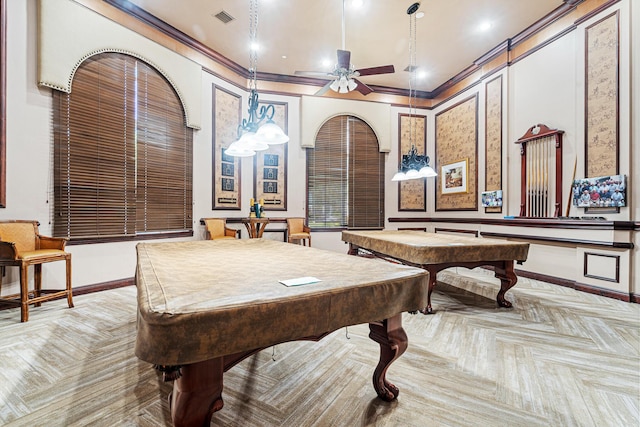 recreation room featuring pool table, crown molding, visible vents, and ceiling fan