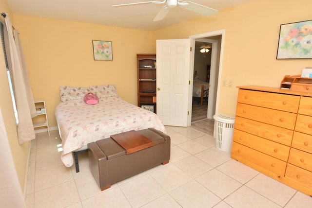 557 SE Seahouse Dr, Port Saint Lucie, FL 34983 - bedroom with light tile patterned floors and ceiling fan