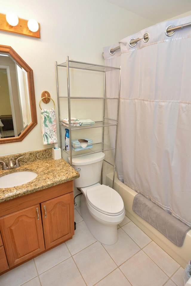 557 SE Seahouse Dr, Port Saint Lucie, FL 34983 - full bathroom with toilet, shower / bathtub combination with curtain, vanity, and tile patterned flooring