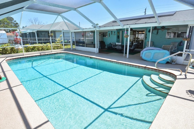 557 SE Seahouse Dr, Port Saint Lucie, FL 34983 - outdoor pool with a patio and a lanai