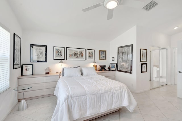 12792 Coral Lakes Dr, Boynton Beach, FL 33437 - bedroom with light tile patterned floors, vaulted ceiling, baseboards, and a ceiling fan