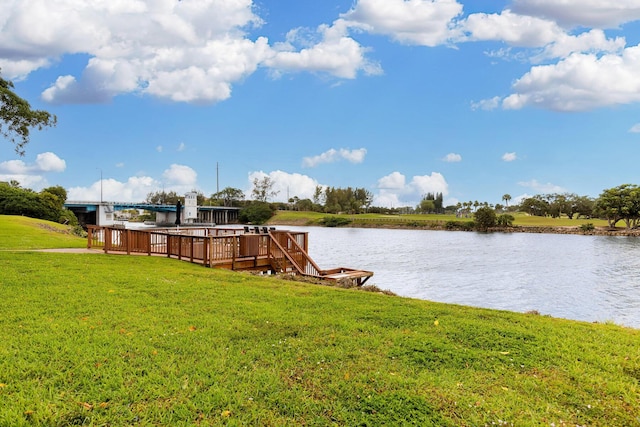 308 Golfview Rd Unit Ph02, North Palm Beach, FL 33408 - view of yard featuring a deck with water view