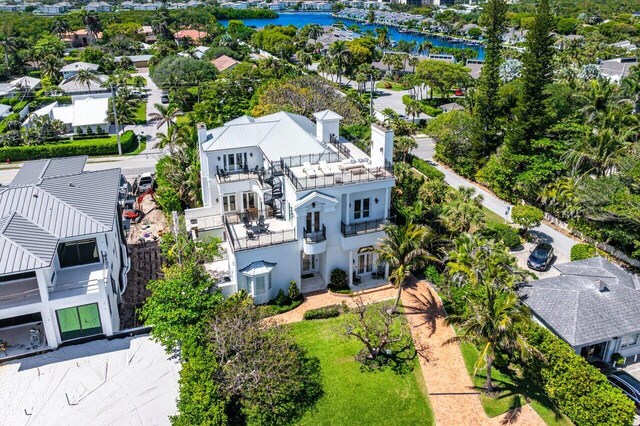 6080 Old Ocean Blvd, Ocean Ridge, FL 33435 - view of front of house featuring a balcony, french doors, decorative driveway, an attached garage, and stairway