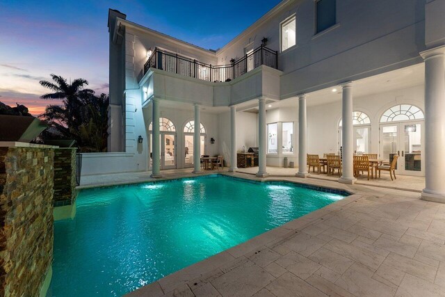 6080 Old Ocean Blvd, Ocean Ridge, FL 33435 - outdoor pool featuring a patio and french doors