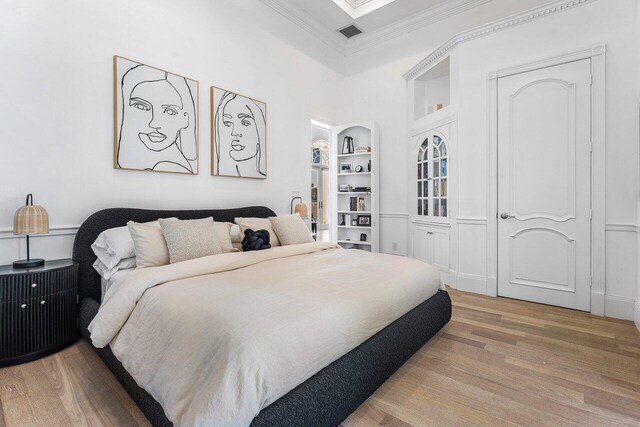 6080 Old Ocean Blvd, Ocean Ridge, FL 33435 - bedroom featuring french doors, ornamental molding, wood finished floors, access to exterior, and a high ceiling