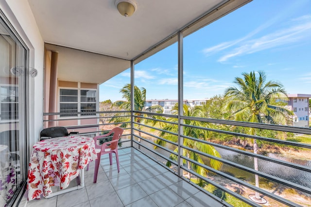 balcony featuring a water view
