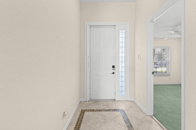 154 Berenger Walk, Royal Palm Beach, FL 33414 - tiled entrance foyer featuring inlaid floor details, baseboards, and a ceiling fan