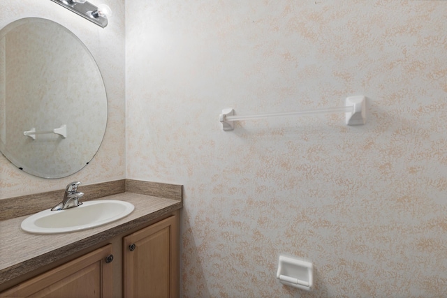 154 Berenger Walk, Royal Palm Beach, FL 33414 - bathroom with vanity and wallpapered walls