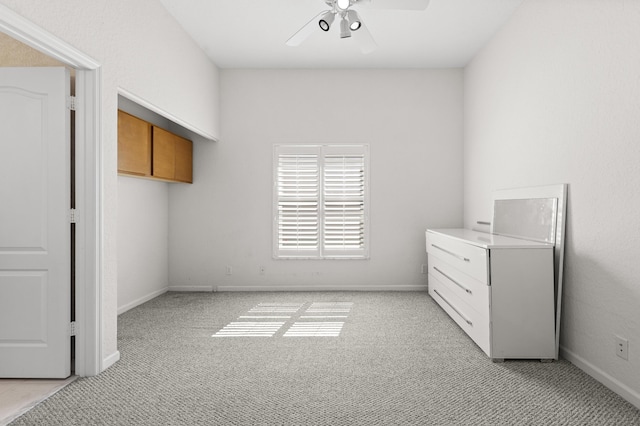 154 Berenger Walk, Royal Palm Beach, FL 33414 - unfurnished bedroom with light colored carpet, baseboards, and a ceiling fan