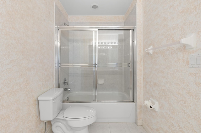 154 Berenger Walk, Royal Palm Beach, FL 33414 - full bath featuring toilet, bath / shower combo with glass door, and tile patterned floors