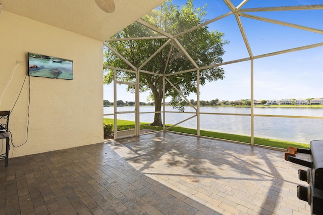 154 Berenger Walk, Royal Palm Beach, FL 33414 - view of patio featuring a water view and a lanai