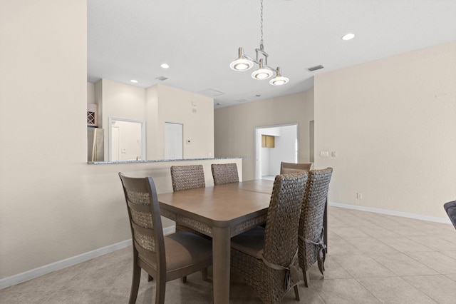 154 Berenger Walk, Royal Palm Beach, FL 33414 - dining area featuring light tile patterned floors, recessed lighting, and baseboards