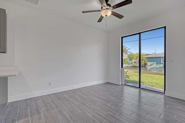 311 Ocean Pkwy, Boynton Beach, FL 33435 - empty room with wood finish floors, visible vents, baseboards, and a ceiling fan