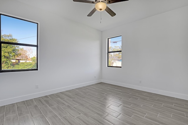 311 Ocean Pkwy, Boynton Beach, FL 33435 - unfurnished room with a ceiling fan, baseboards, and light wood finished floors