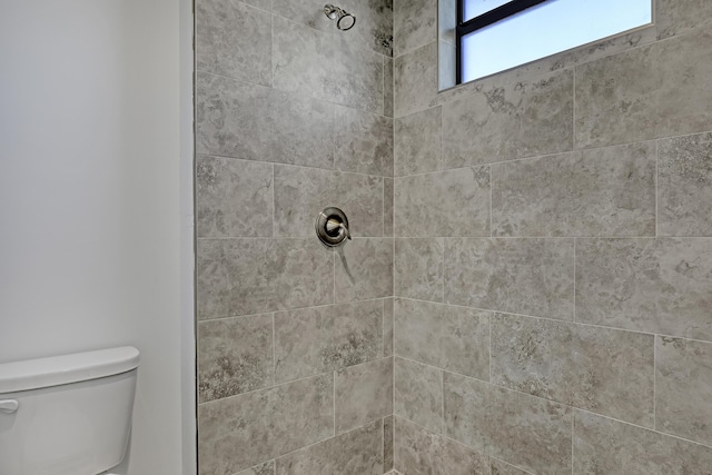 311 Ocean Pkwy, Boynton Beach, FL 33435 - bathroom featuring toilet and tiled shower