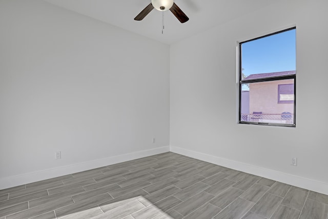 311 Ocean Pkwy, Boynton Beach, FL 33435 - unfurnished room featuring wood finish floors, baseboards, and a ceiling fan
